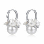 Shop our stunning ladies artificial earrings featuring a simulated pearl and cubic zirconia set in rhodium-plated silver.