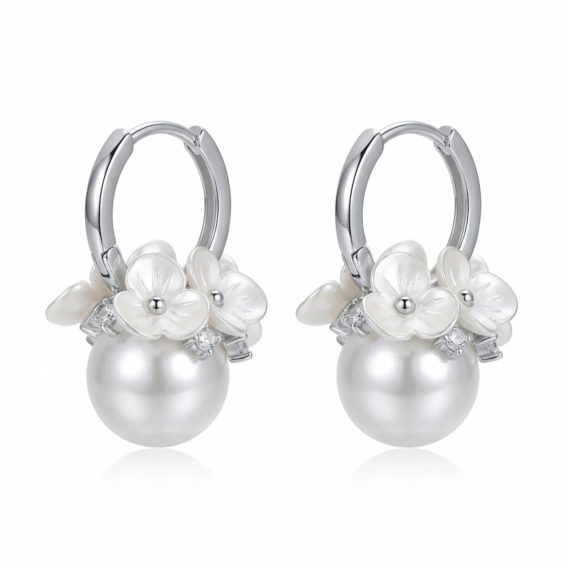 Shop our stunning ladies artificial earrings featuring a simulated pearl and cubic zirconia set in rhodium-plated silver.