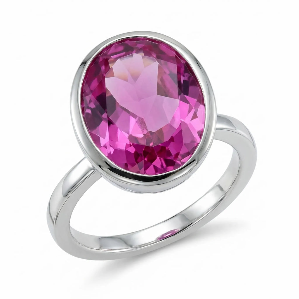 Front view of the Large Oval Pink Purple Quartz Ring crafted in 925 sterling silver, highlighting the vibrant magenta pink gemstone solitaire.