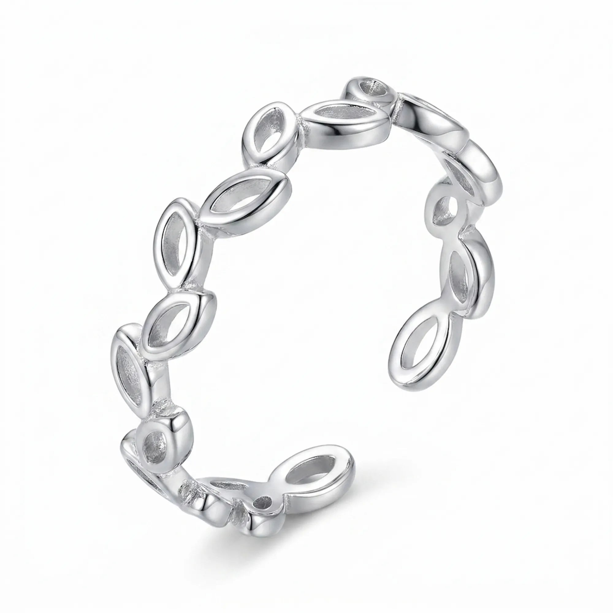 Rhodium 925 silver leaf-vine ear cuff for non-pierced wear, beside a velvet box on marble. Luna Dura Dubai.