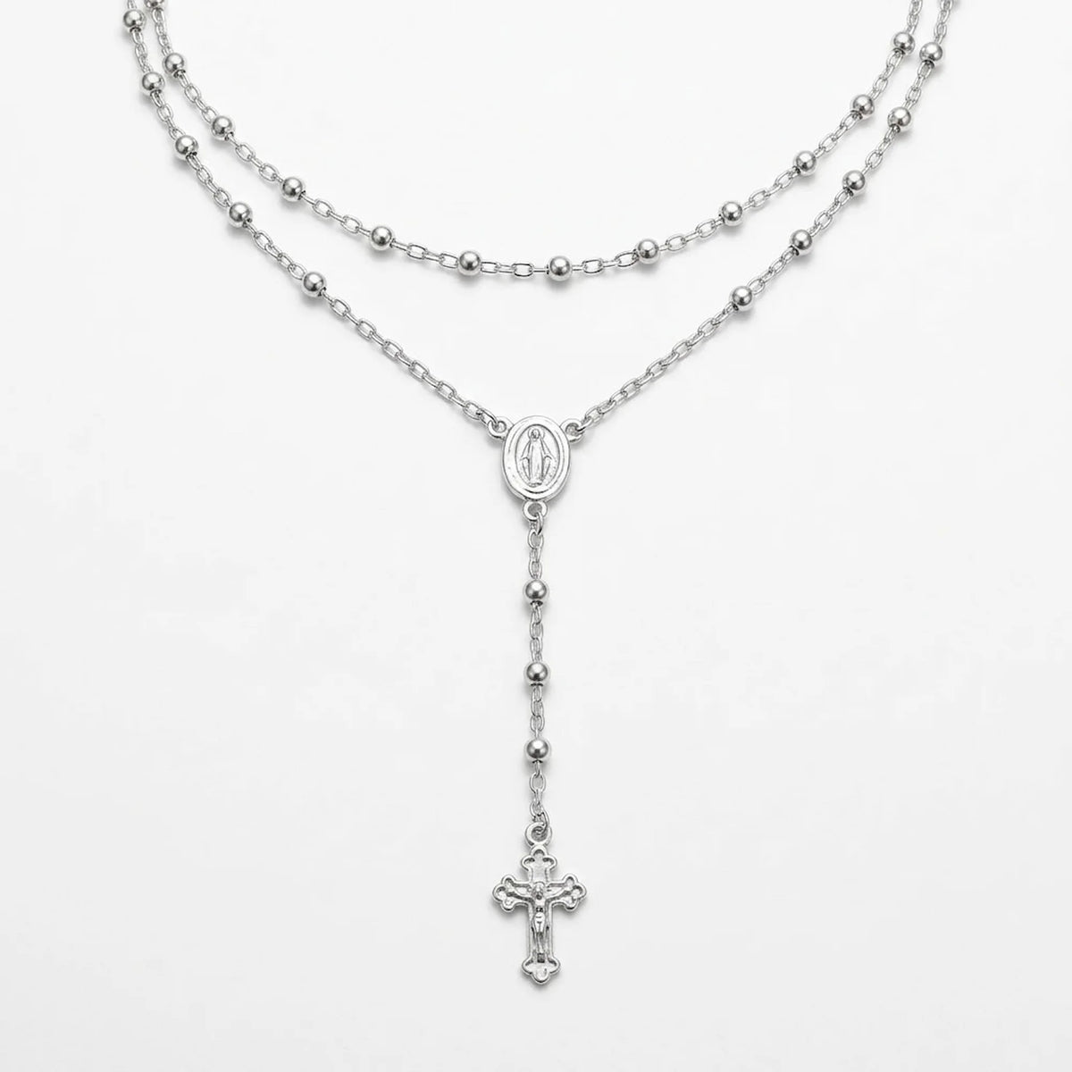 Long 60 cm Italian 925 silver rosary-style Y necklace with polished beads, oval Miraculous Medal and small crucifix on white.