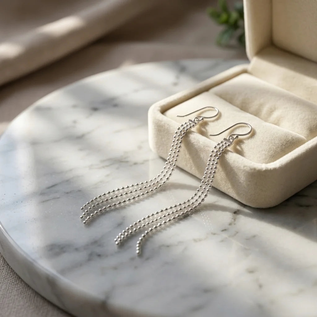 Long 925 sterling silver ball chain tassel earrings displayed in a gift box in Dubai.