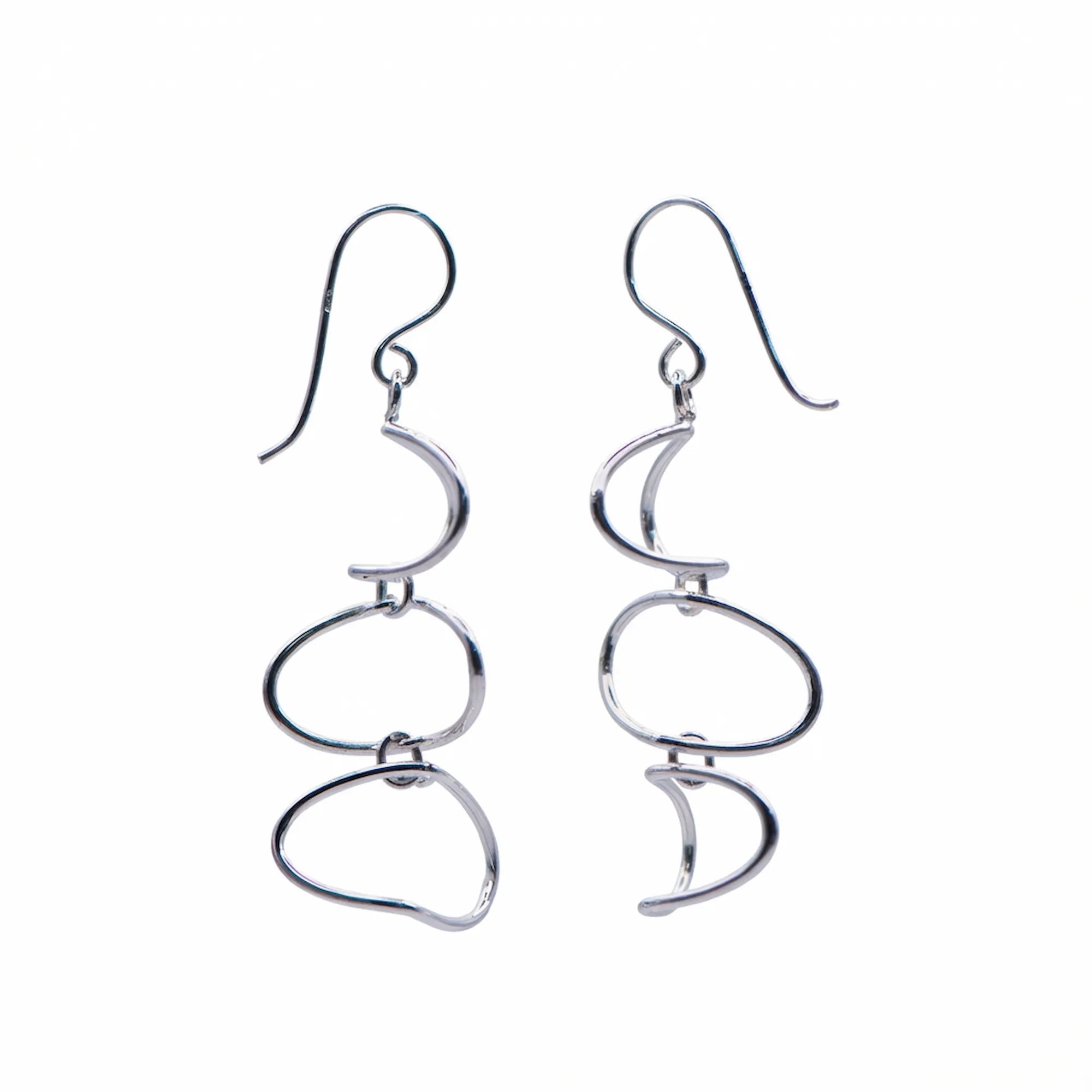 Abstract cascading loop drop earrings in 925 sterling silver on white background, 16x46mm Dubai