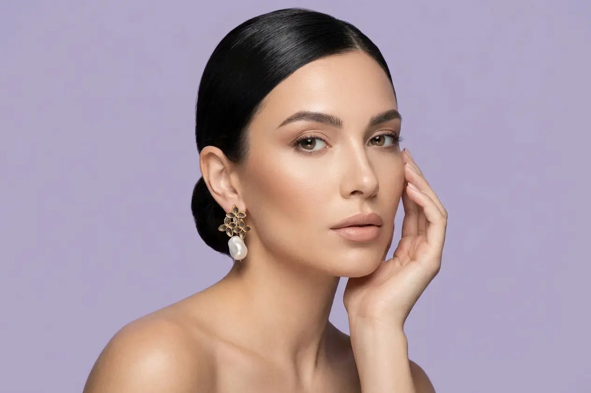 925 sterling silver rose gold freshwater pearl earrings — Luna Dura in Dubai.