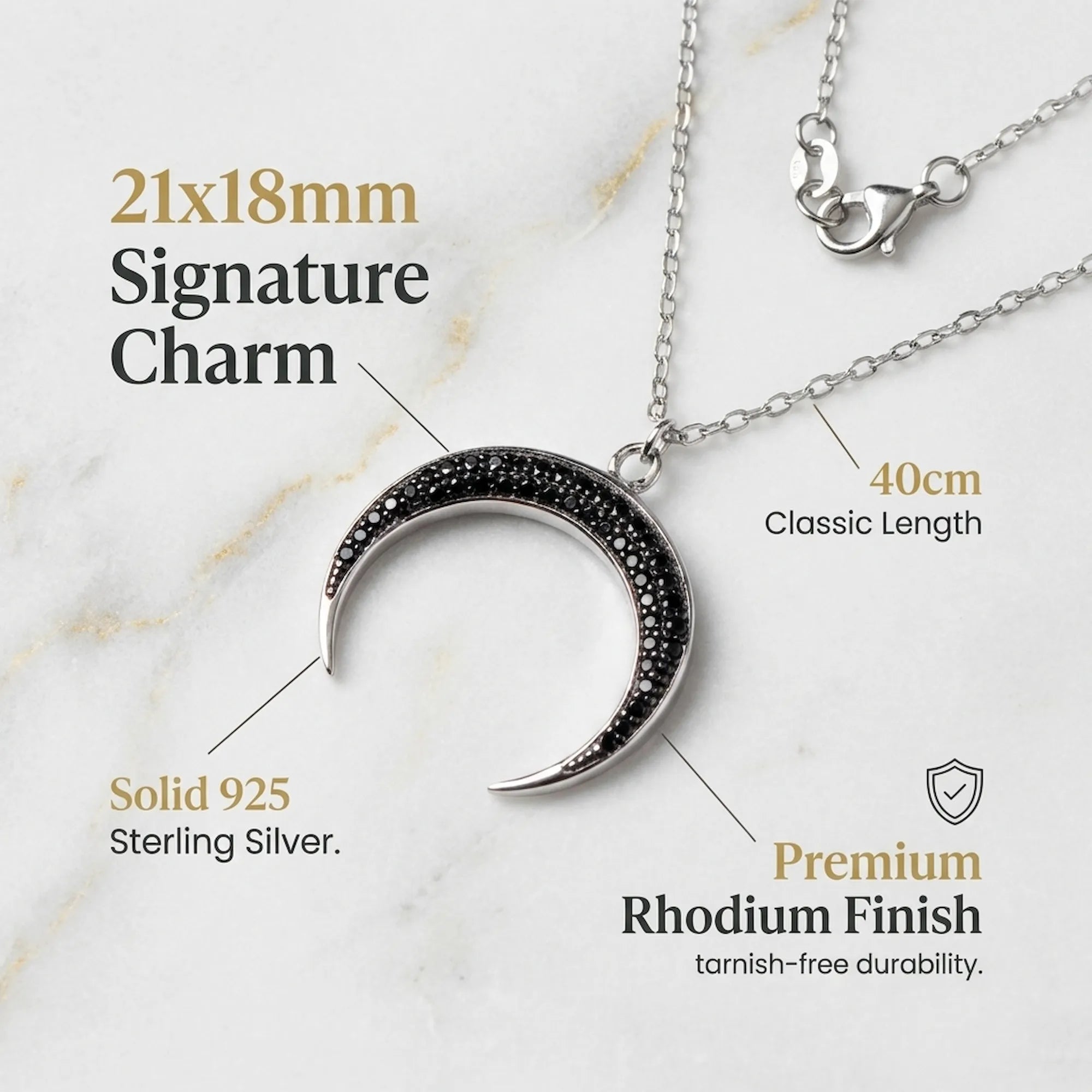 Product infographic for the Luna Dura crescent pendant detailing the 925 sterling silver material, rhodium finish, and 21x18mm dimensions
