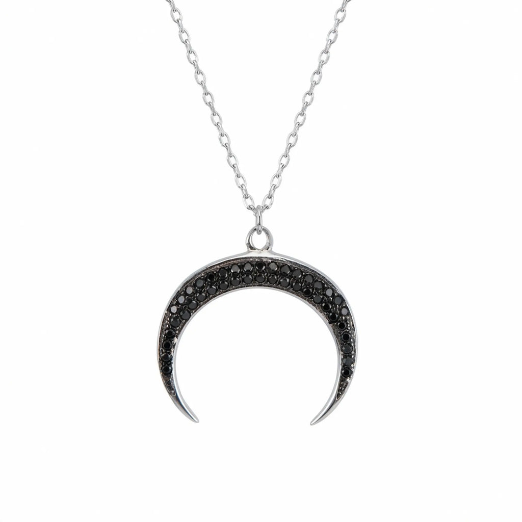 Minimalist 925 sterling silver necklace featuring a lunula crescent pendant set with pave black zircon gemstones, designed by Luna Dura