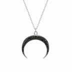 Minimalist 925 sterling silver necklace featuring a lunula crescent pendant set with pave black zircon gemstones, designed by Luna Dura
