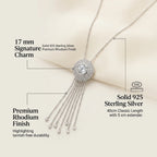 Infographic for the Surayya silver tassel necklace detailing the 17mm signature charm, 925 sterling silver, and tarnish-free rhodium finish.
