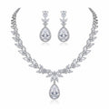 Rhodium-plated cubic zirconia necklace and earrings set featuring marquise leaf clusters and halo teardrop drops in Dubai.