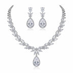 Rhodium-plated cubic zirconia necklace and earrings set featuring marquise leaf clusters and halo teardrop drops in Dubai.