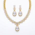 18k gold-plated cubic zirconia necklace and earrings set featuring marquise leaf clusters and halo teardrop drop in Dubai.