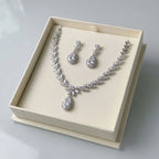 Rhodium-plated cubic zirconia marquise leaf and halo teardrop bridal necklace set displayed in a gift box in Dubai.