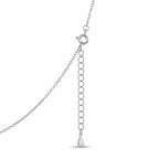 Close-up of the sterling silver mini rolo chain, spring-ring clasp and extender tail on an evil eye necklace.