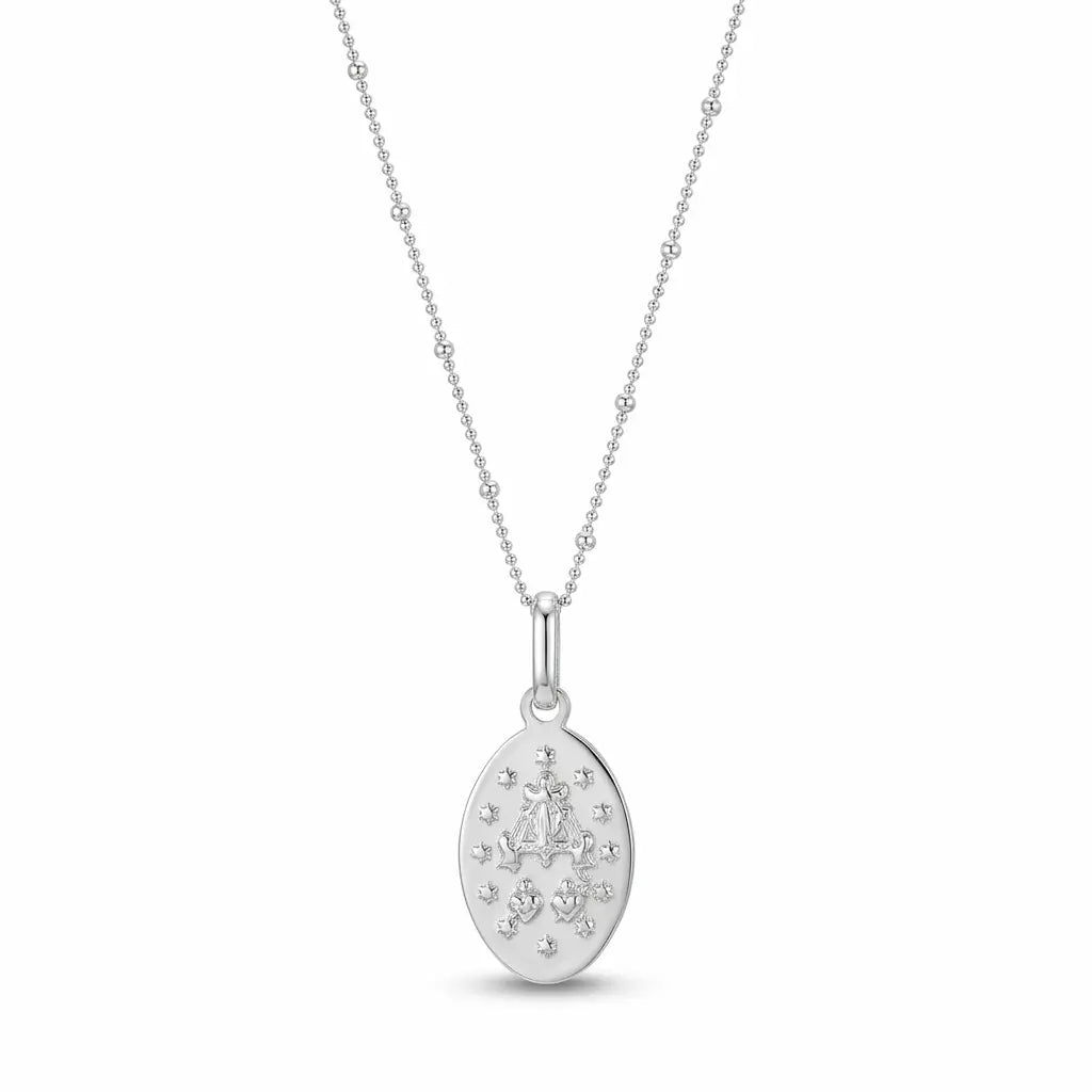 Reverse of 925 silver Miraculous Medal showing Marian symbols and stars.
