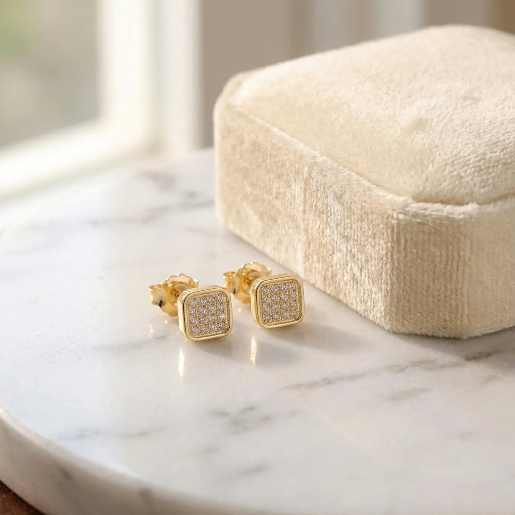 18K gold-plated 925 sterling silver mosaic pavé cubic zirconia stud earrings on marble — square cushion pavé face