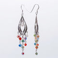 Silver filigree chandelier earrings with cascading millefiori glass beads
