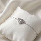 North Star pavé heart bracelet on white satin cushion — rhodium 925 silver gifting presentation Luna Dura Dubai UAE