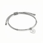 North Star heart bracelet, 925 sterling silver curved bar on grey cord with engraved heart charm, Dubai