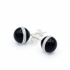 Orbital black stud earrings, black resin orb with a cubic zirconia halo in 925 sterling silver, Dubai