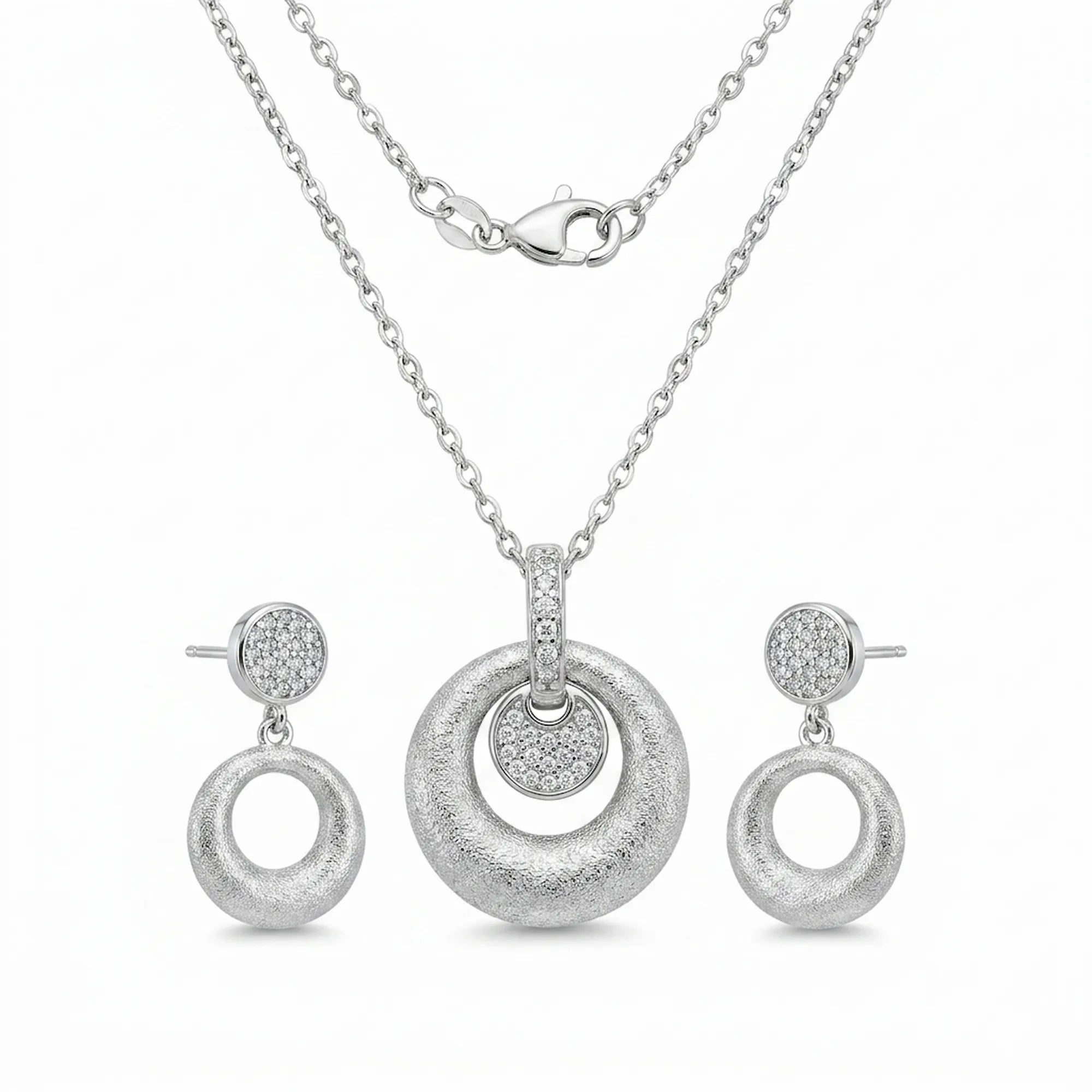 Brushed rhodium silver orbiting disc pendant necklace and circle drop earrings — 925 sterling silver set white background