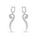 Paved serpent drop earrings in rhodium 925 silver — green CZ eye, mixed round and baguette cubic zirconia, white background