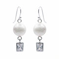 925 silver pearl bridal drop earrings from Luna Dura Dubai, a round pearl above a bezel-set rectangular cubic zirconia.