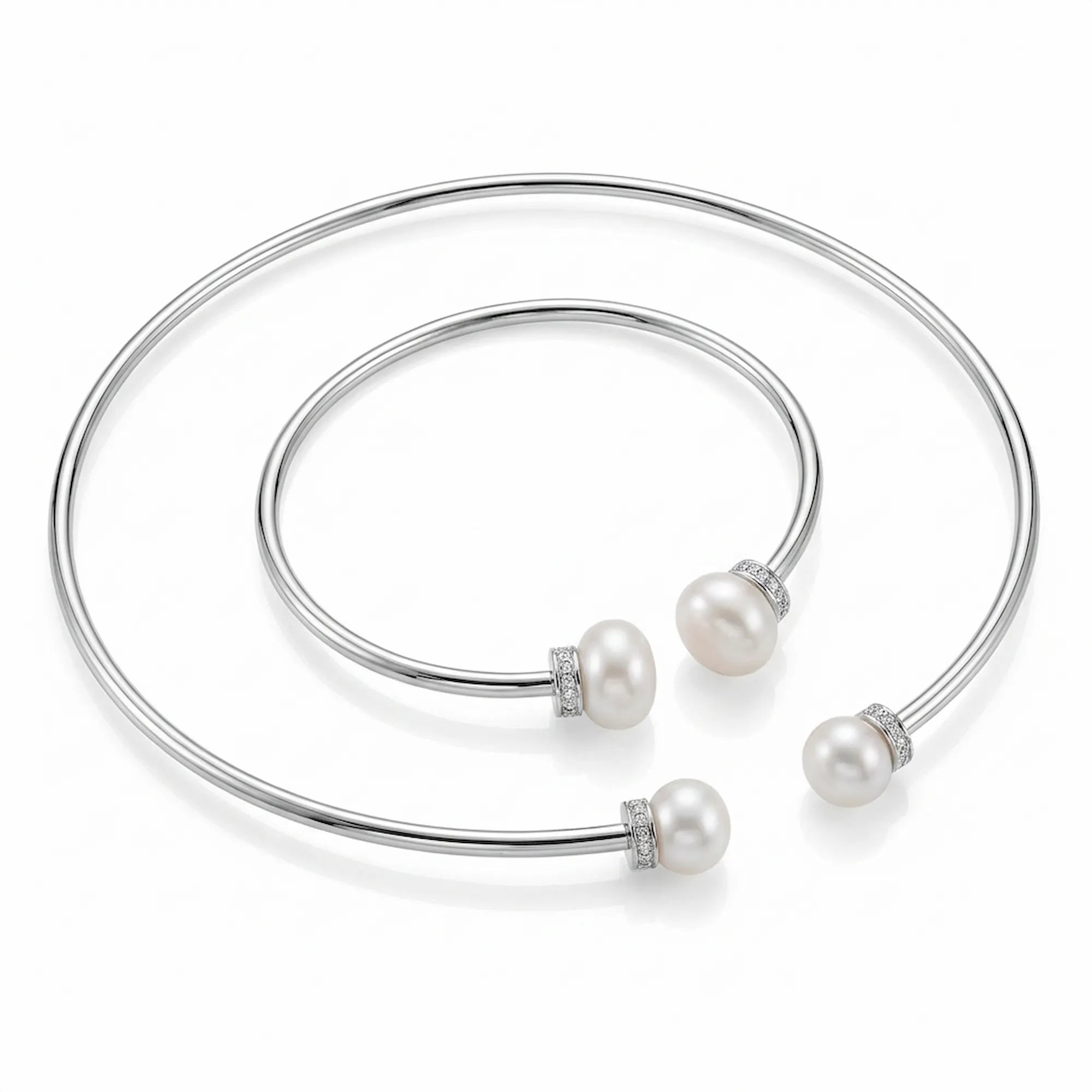 Angled perspective of the real pearl necklace and bangle set showcasing the sparkling pave cubic zirconia details and white gold finish.