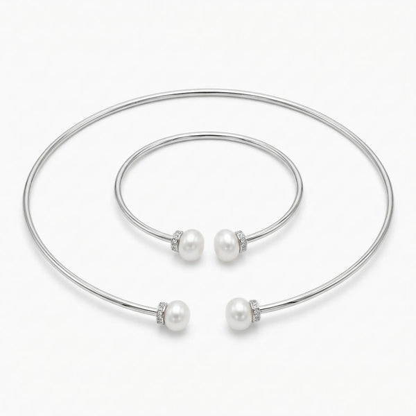 Front view of the Luna Dura pearl necklace set in 925 sterling silver in dubai featuring a torque choker and matching bangle with fresh water pearls.