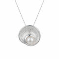 925 silver pearl vortex pendant necklace front view, textured disc with freshwater pearl centre in Dubai.