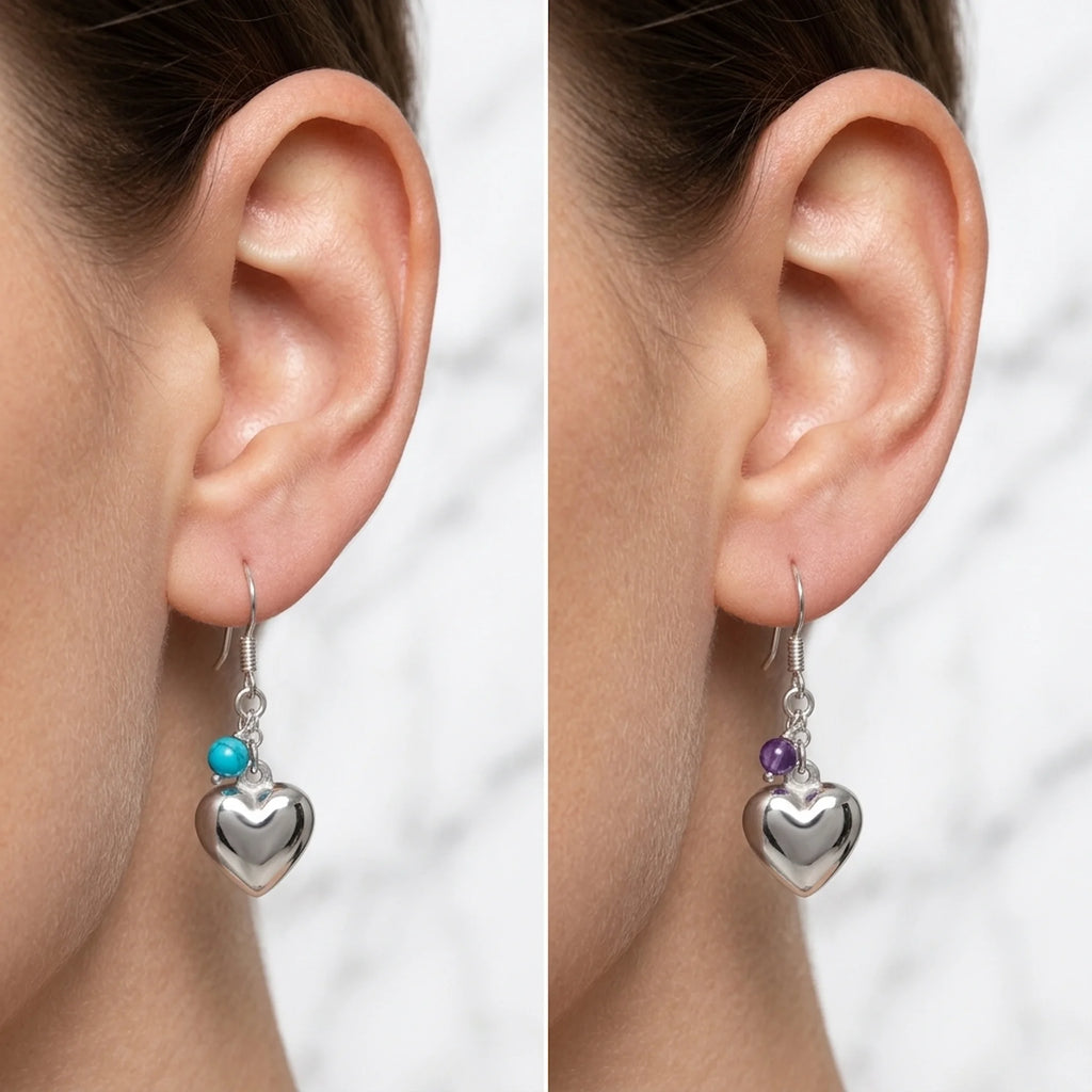 Silver puffed heart bead earrings shown close on the ear in blue and purple variants — 925 sterling silver dangle