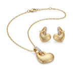 Matte satin 18K gold puffed heart pendant necklace and drop earrings in 925 sterling silver — white background