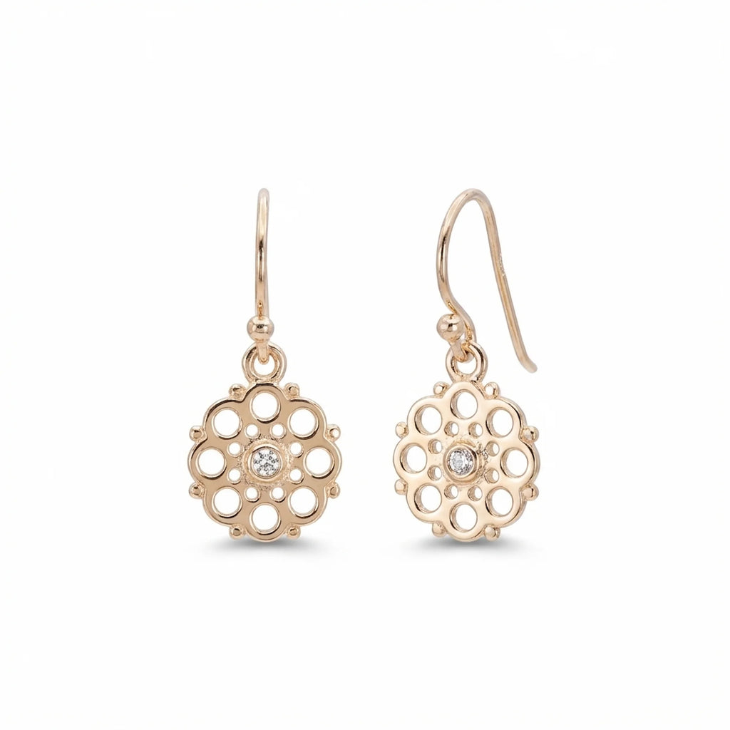 Gold vermeil radial disc drop earrings with concentric apertures and cubic zirconia in Dubai.