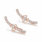 Buy our rose gold floral ear climbers made of 925 sterling silver with CZ stones, featuring a sleek, single-piercing design.