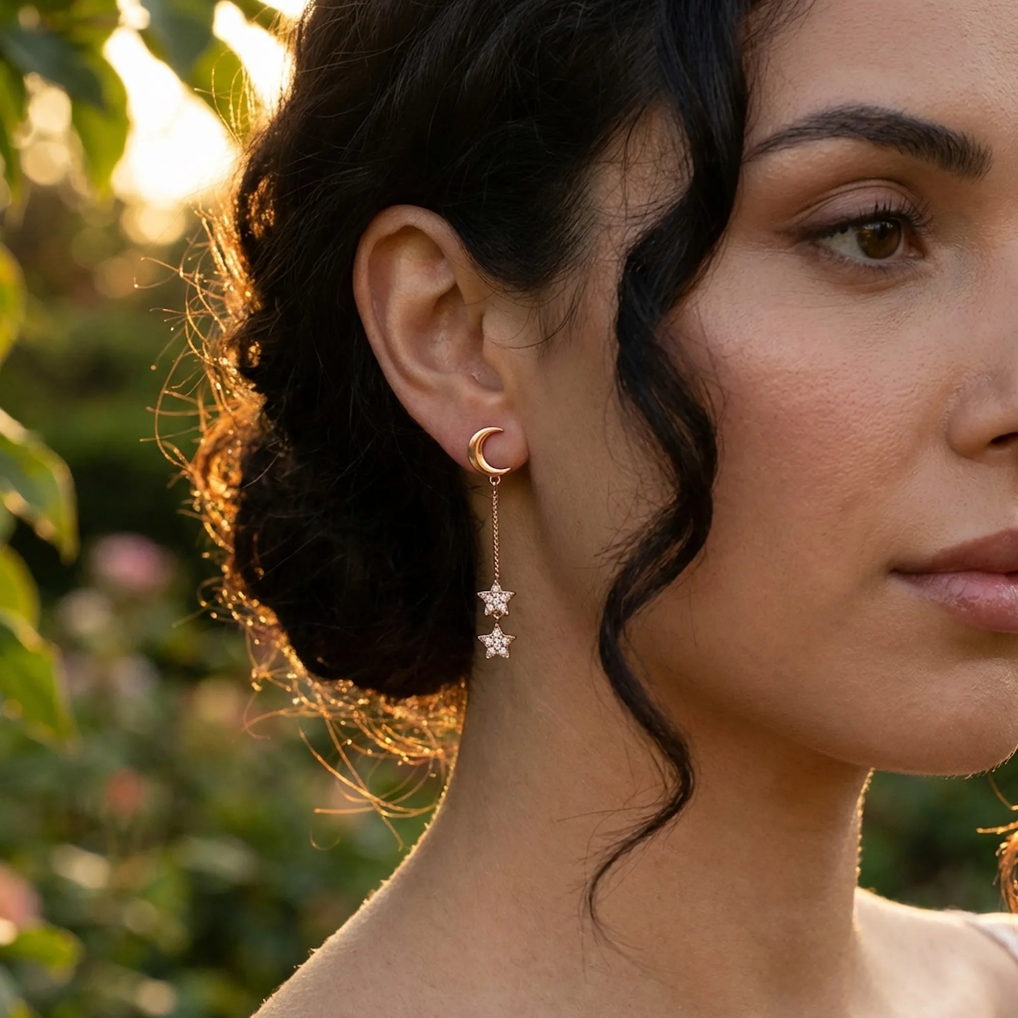Rose gold crescent moon and pave star drop earring worn on the ear at golden hour, 925 silver, Dubai UAE