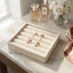 Rose gold moon and star drop earrings on a velvet tray with roses and perfume, gift-ready, Luna Dura Dubai