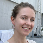 Model wearing natural rose quartz teardrop earrings at Alserkal Avenue Dubai arts district — genuine gemstone earrings UAE