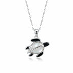 Sea turtle pendant necklace in 925 sterling silver with Mother of Pearl shell and black enamel flippers, white background