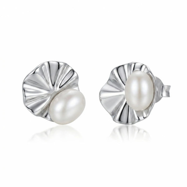 Shell pearl stud earrings rhodium 925 silver isolated on white background, fan shell motif with pearl centre in Dubai.