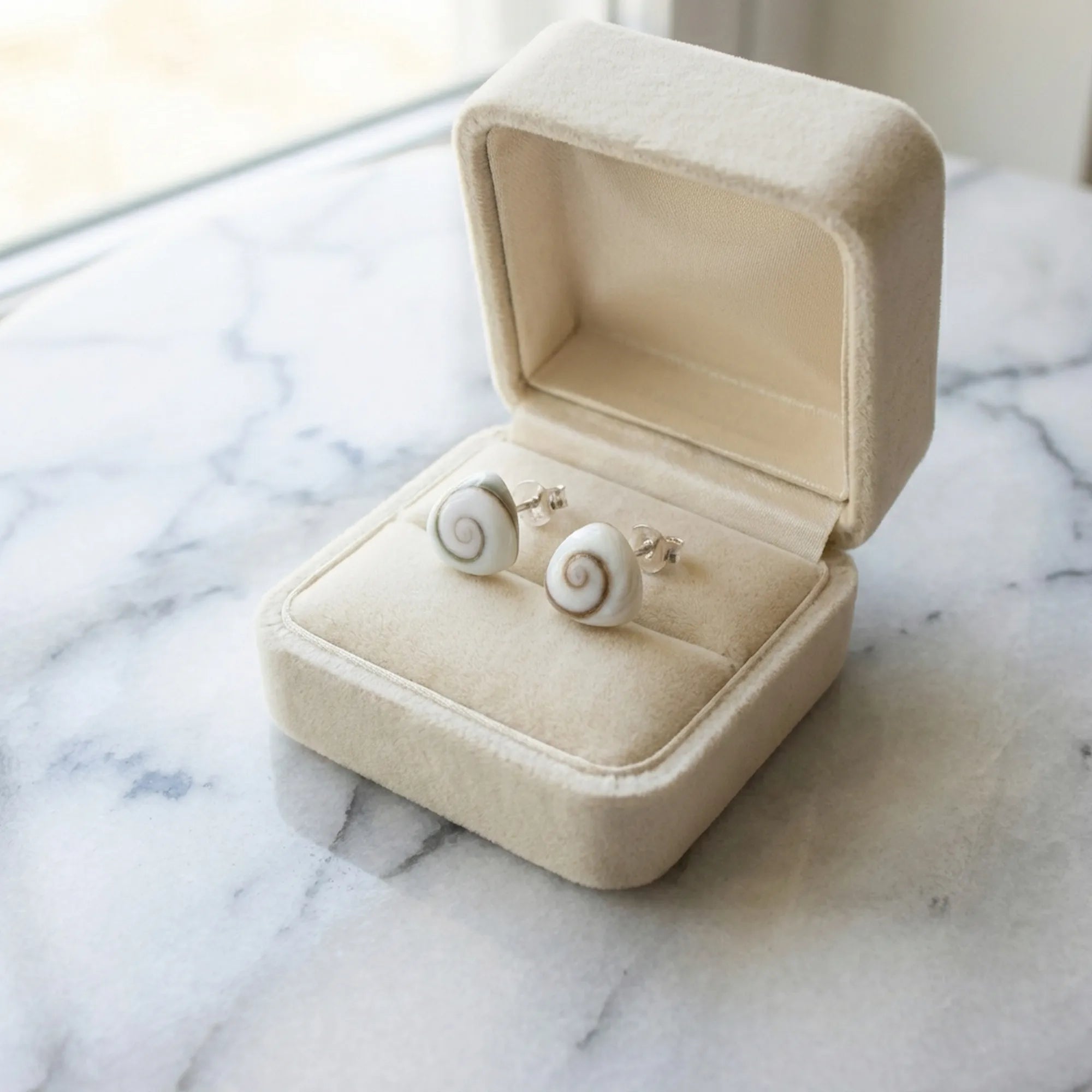 Shiva Eye shell silver stud earrings in a cream gift box, gift-ready from Luna Dura Dubai