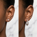 Woman wearing silver cubic zirconia convertible stud and lattice hoop earrings, offering day to night style in Dubai.