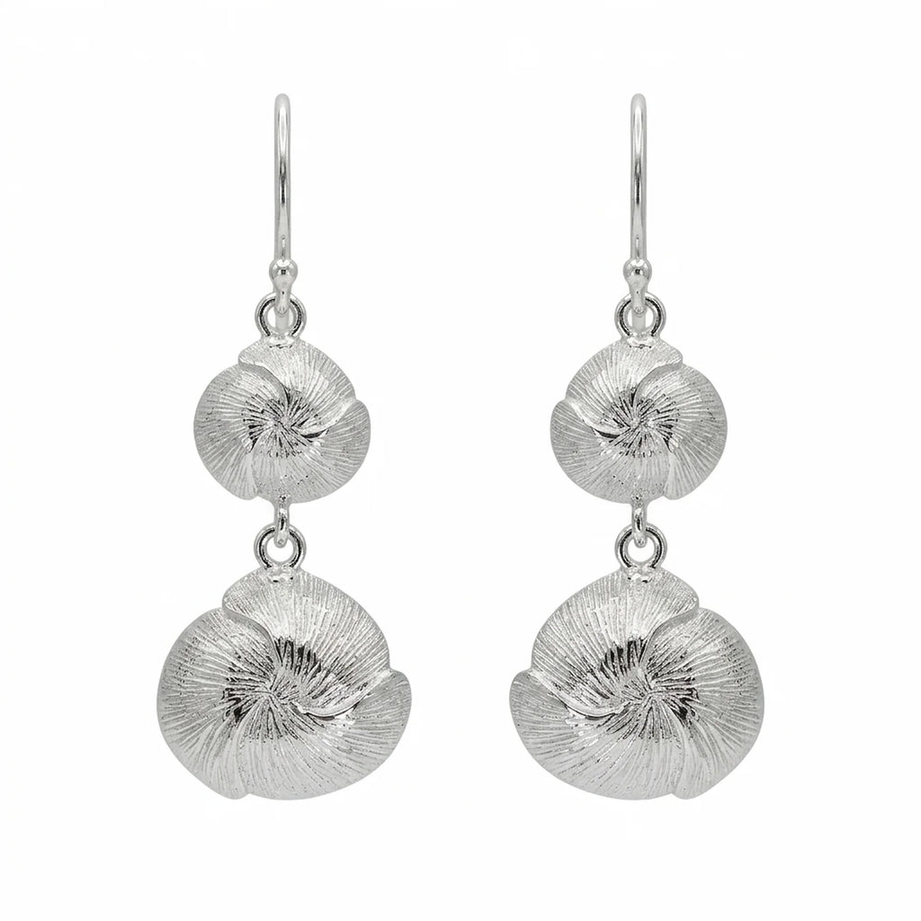 Back view of the 925 sterling silver lotus drop earrings showing organic twig-like texture, handcrafted in Dubai.