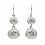 Back view of the 925 sterling silver lotus drop earrings showing organic twig-like texture, handcrafted in Dubai.
