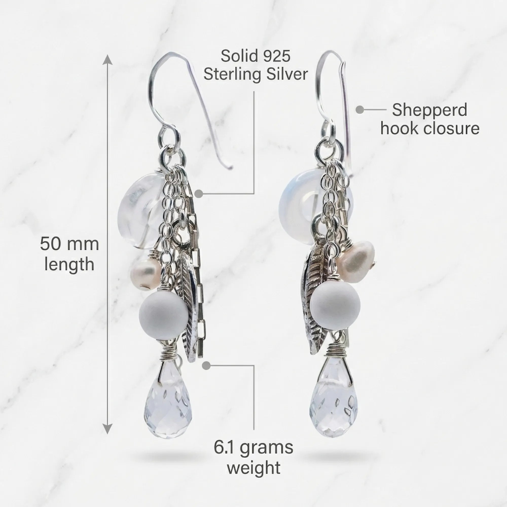 Technical dimensions and materials guide for our 925 sterling silver leaf chain drop earrings showcasing weight, length, and stone type.