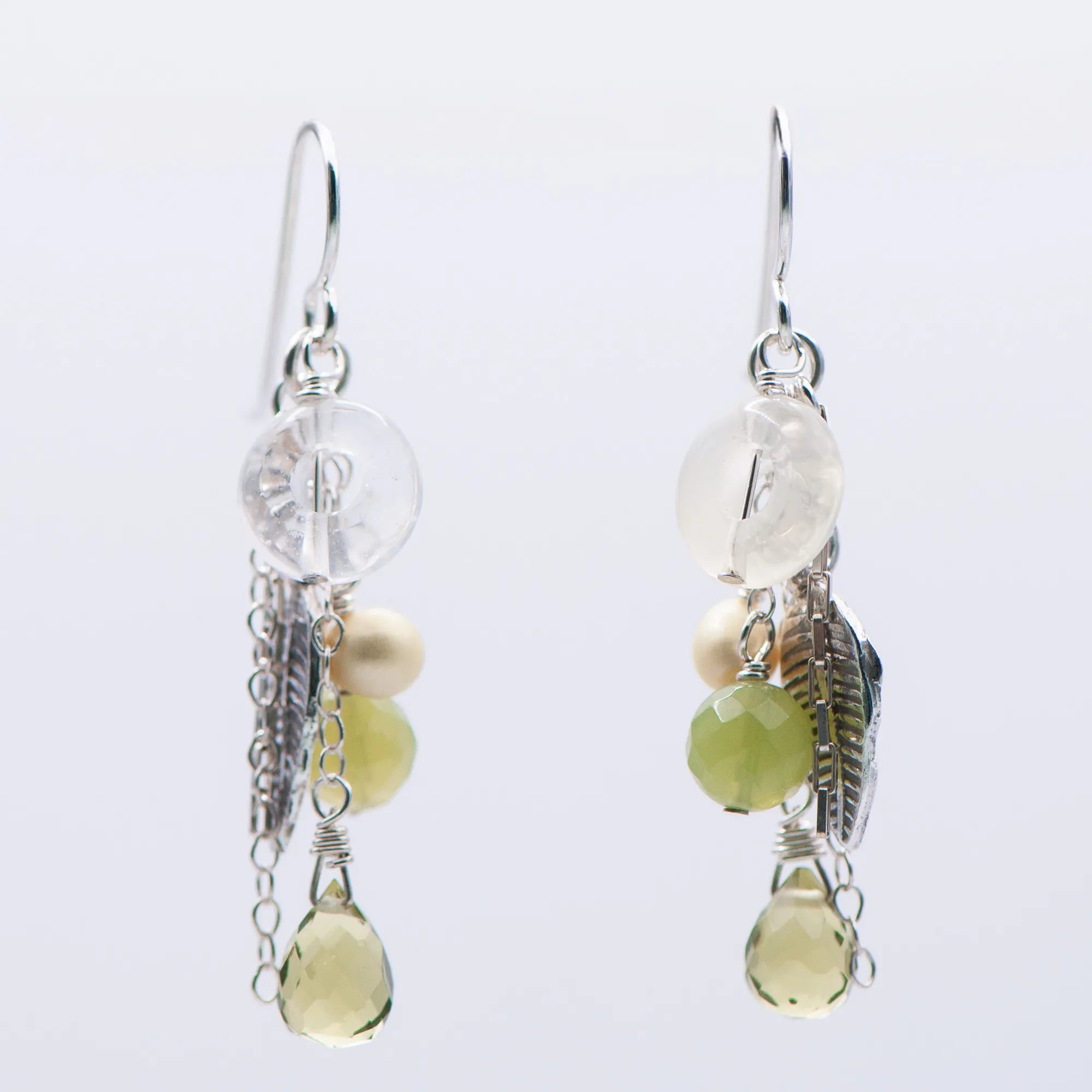 Shop our vibrant Harvest Cascade silver leaf chain drop earrings crafted with 925 sterling silver and lime green semiprecious stones.