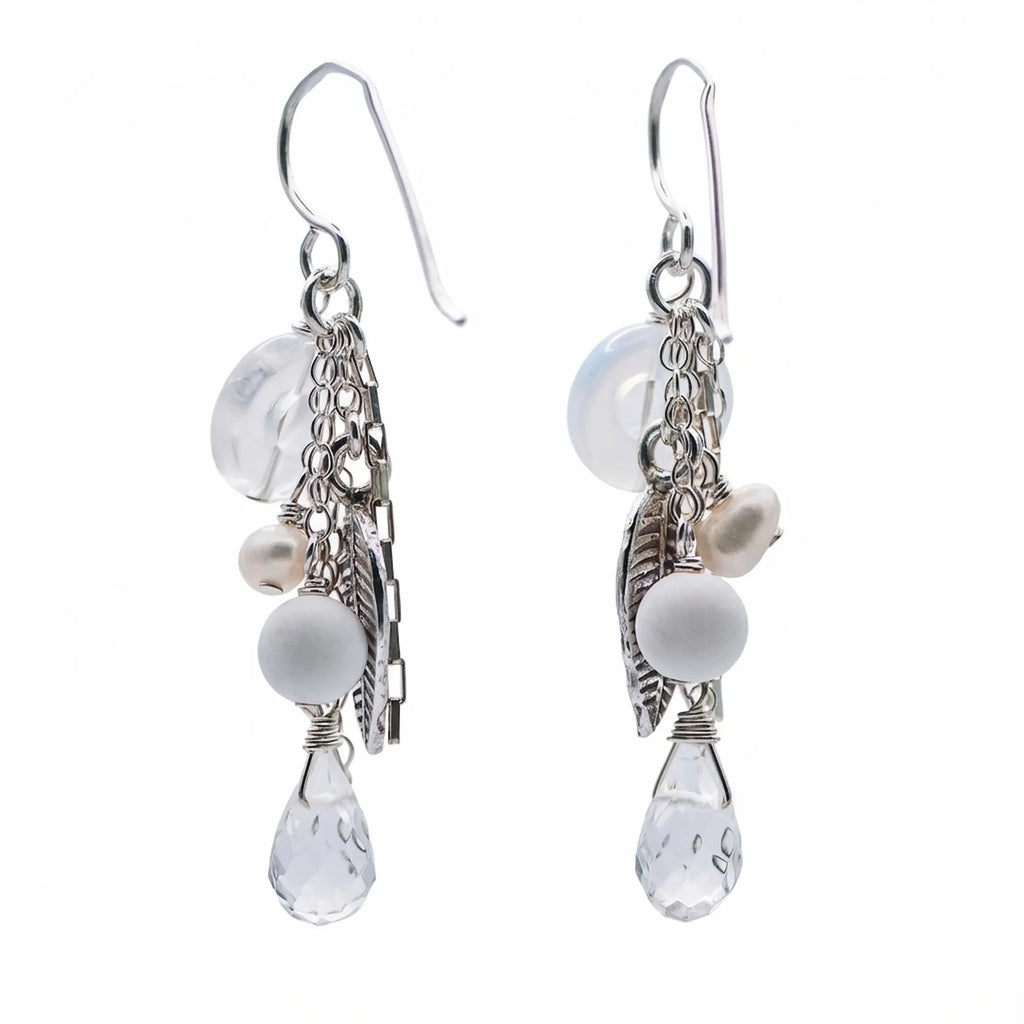 Shop the Harvest Cascade silver leaf chain drop earrings made of 925 sterling silver, simulated pearls, and snow quartz natural stones.