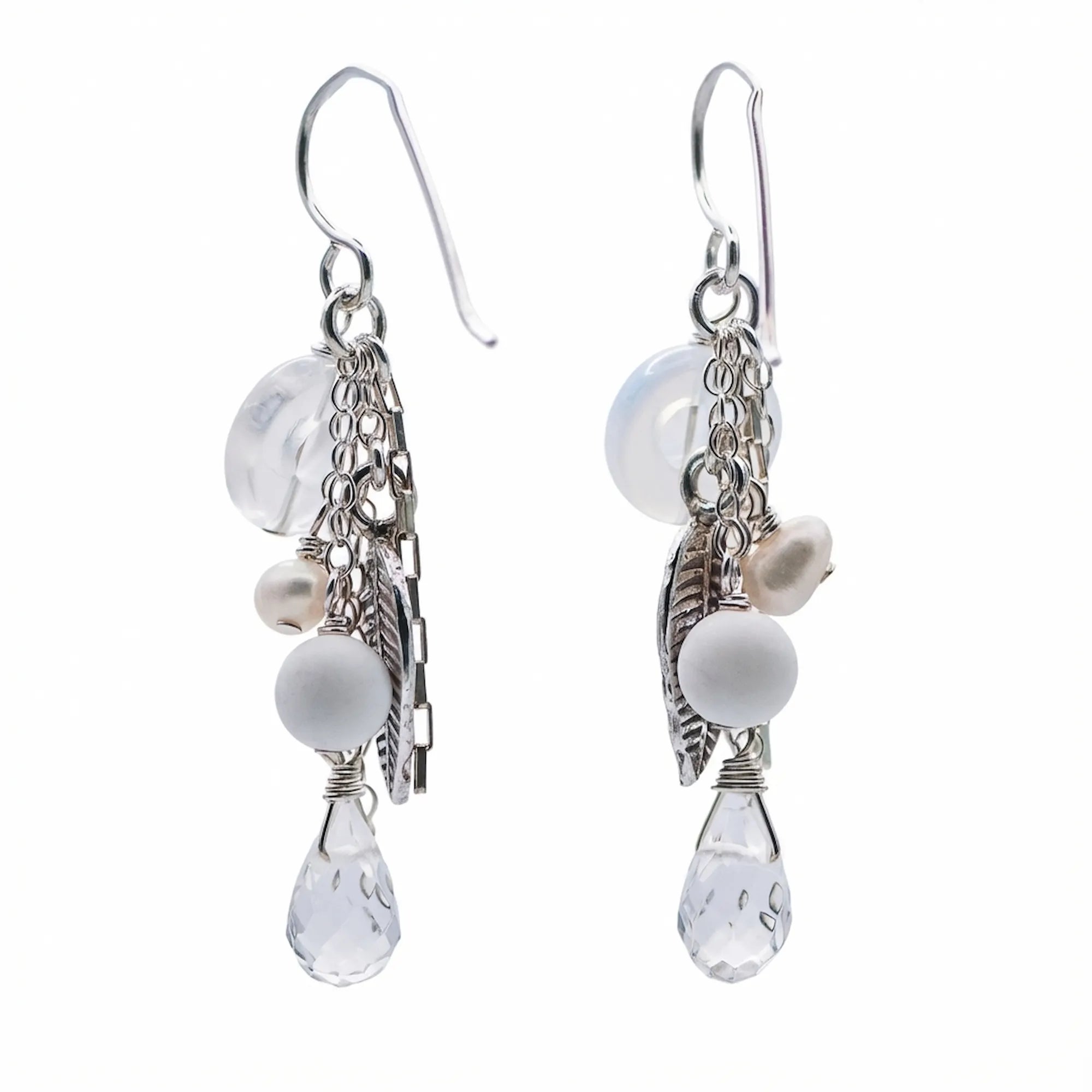 Shop the Harvest Cascade silver leaf chain drop earrings made of 925 sterling silver, simulated pearls, and snow quartz natural stones.