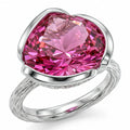 Front view of the 925 sterling silver vivid magenta quartz lotus cocktail ring with a branch-textured shank in Dubai.