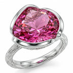 Front view of the 925 sterling silver vivid magenta quartz lotus cocktail ring with a branch-textured shank in Dubai.