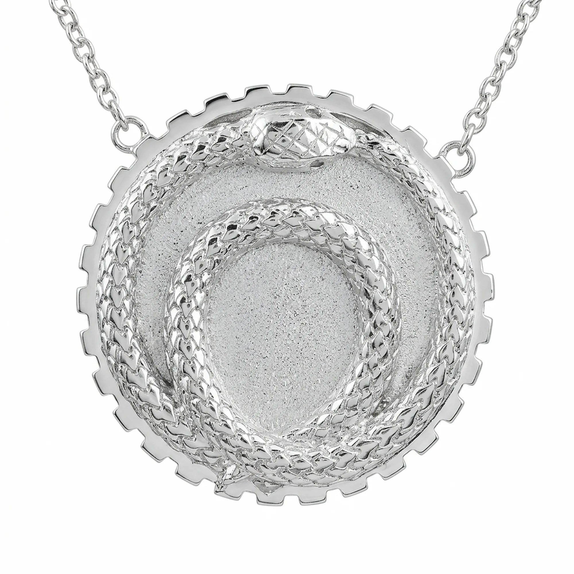 Silver ouroboros snake pendant crafted in 925 sterling silver with a toothed cog border, a milestone gift in Dubai.