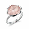 Front view of the 925 sterling silver natural rose quartz lotus cocktail ring with a branch-textured shank in Dubai.
